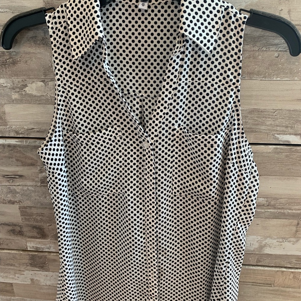 Polka dot sleeveless blouse